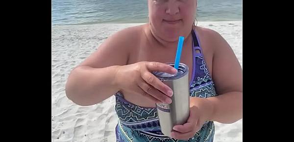  Slutty Bbw duca wife flashes her big tits on a public beach